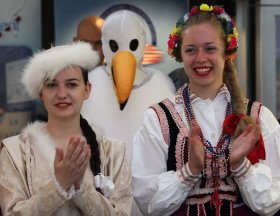 Emily Lemmon, left, and Julia Kulesza of Windsor's Polish Community along with Amherstburg's Department of Recreation and Culture bird mascot, centre, were part of Tourism Week Kick Off event hosted by Tourism Windsor Essex Pelee Island (TWEPI) and Windsor's Ontario Travel Information Centre Park Street East office Monday June 10, 2013. (NICK BRANCACCIO/The Windsor Star)