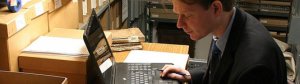 Man at desk with laptop