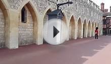 A british royal guard walking in Lower Ward of Windsor Castle