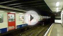 Circle Line Train at Tower Hill Station in London