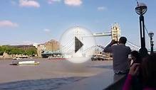 tower bridge closing view of ms fram next to hms belfast